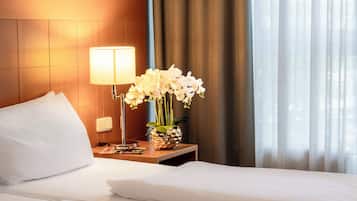 Desk, blackout curtains, iron/ironing board, rollaway beds