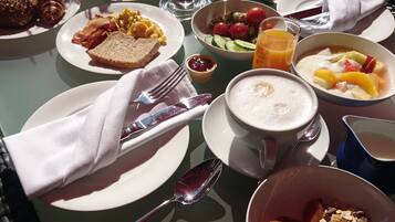 Daily buffet breakfast (EUR 23.00 per person)