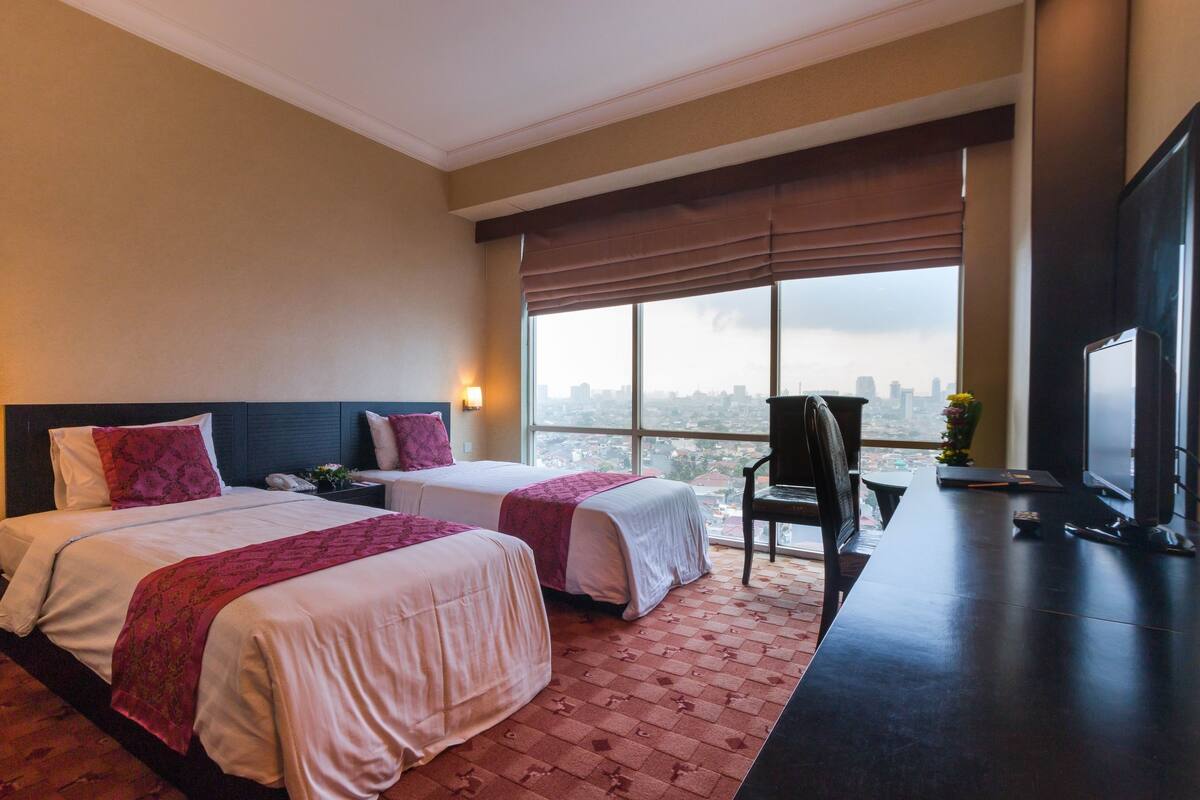 Quarto luxo | Escrivaninha, camas extras/dobráveis (sobretaxa), Wi-Fi de cortesia