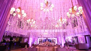A spacious lobby with a central seating area, chandeliers, and a stage in the background. - Park Plaza Ludhiana (Ludhiana)