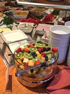 Fresh fruit and cheese await at the buffet.