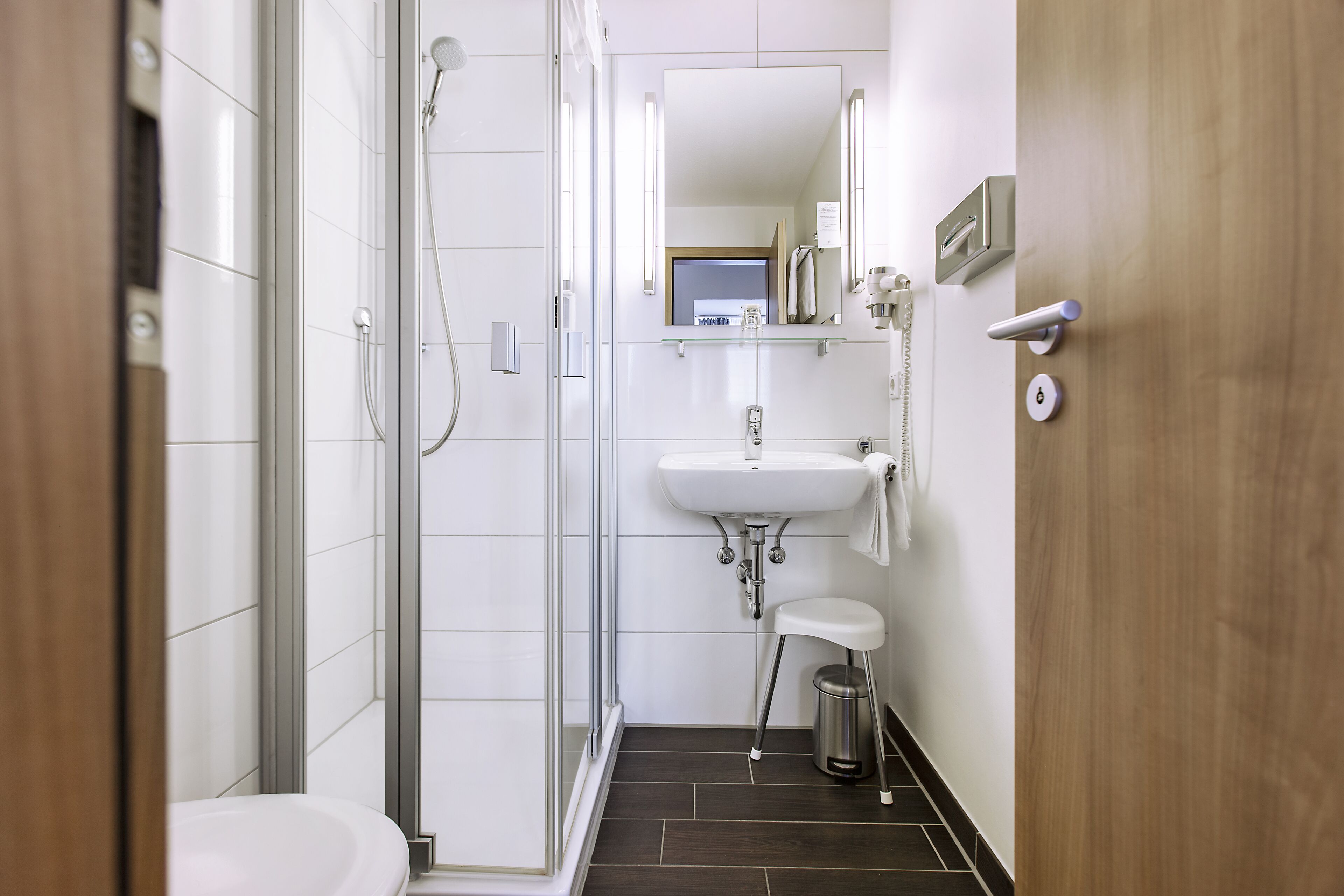 economy single room, 1 single bed, non smoking | bathroom | hair dryer, towels, soap, shampoo