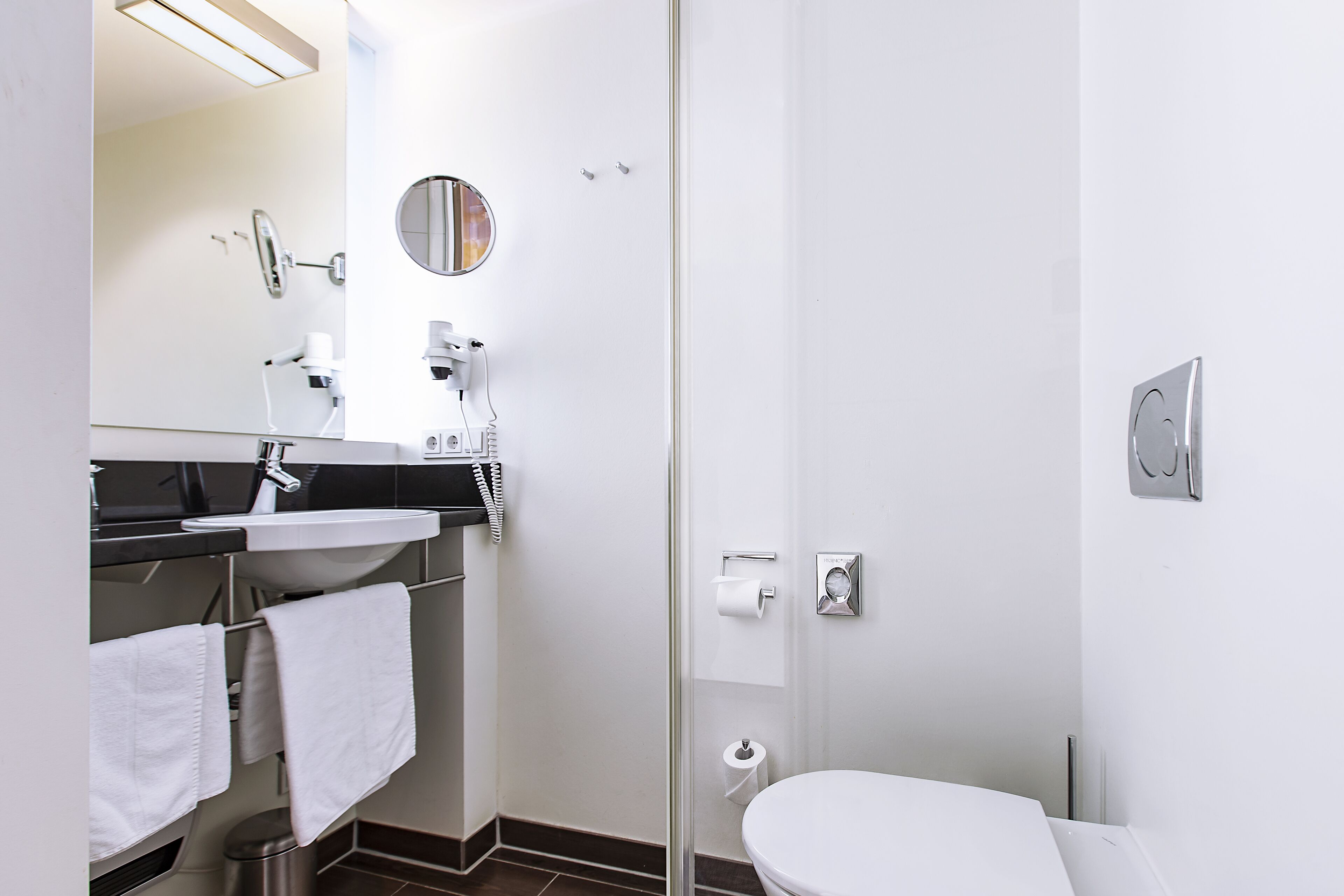 hair dryer, towels, soap, shampoo