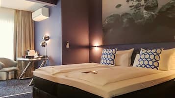 Junior Suite | Pillowtop beds, in-room safe, individually furnished, desk