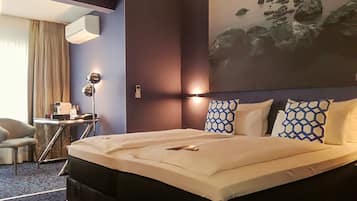 Junior Suite | Pillow-top beds, in-room safe, individually furnished, desk