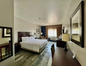 Quarto standard, 1 cama King | Escrivaninha, ferros/tábuas de passar roupa, Wi-Fi de cortesia