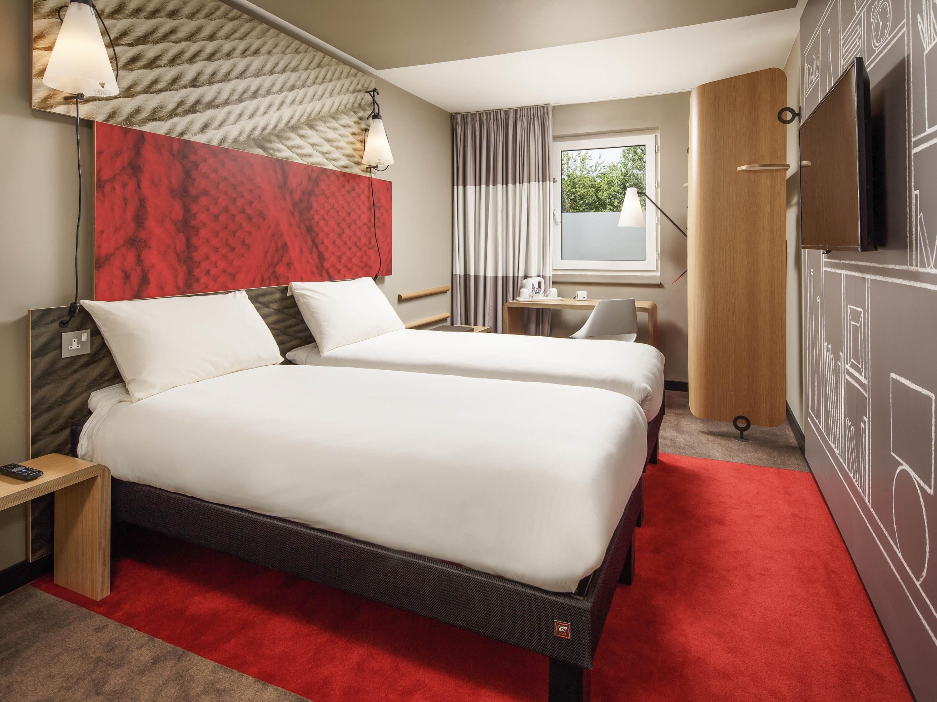 Desk, blackout curtains, soundproofing, free cots/infant beds