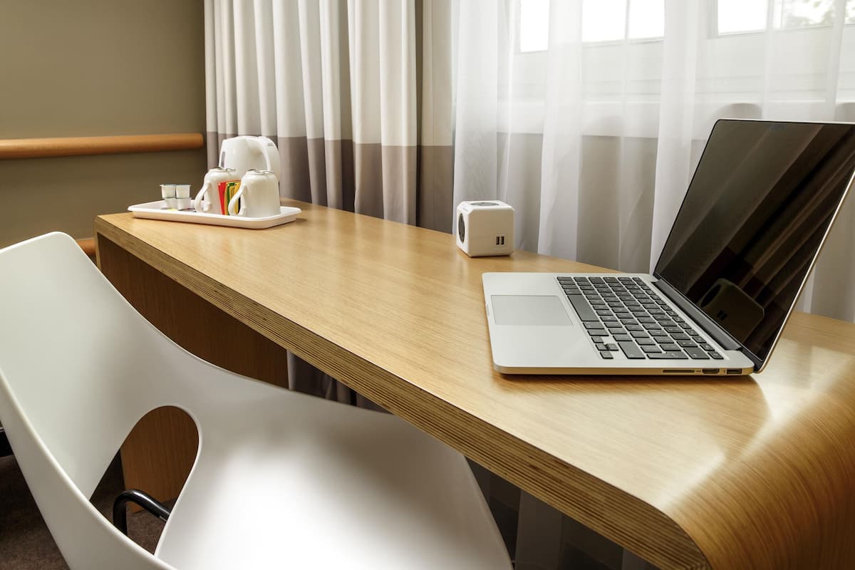 Desk, blackout curtains, soundproofing, free cots/infant beds