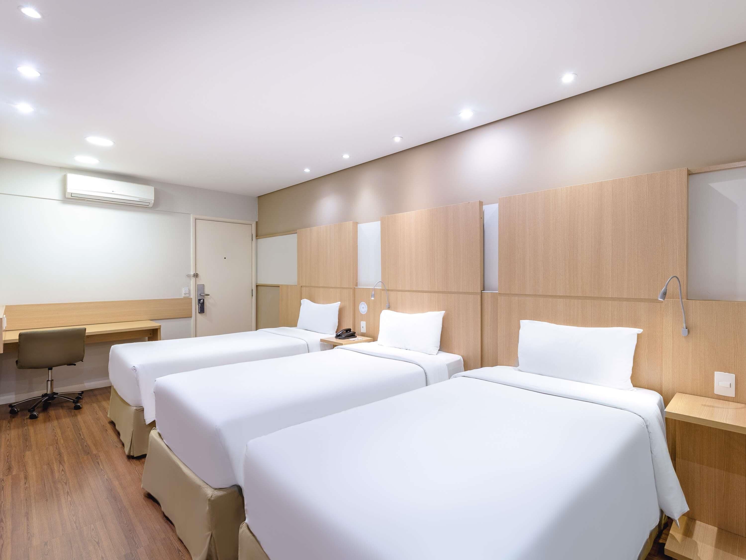 Standard Room, Multiple Beds | Minibar, in-room safe, desk, blackout curtains