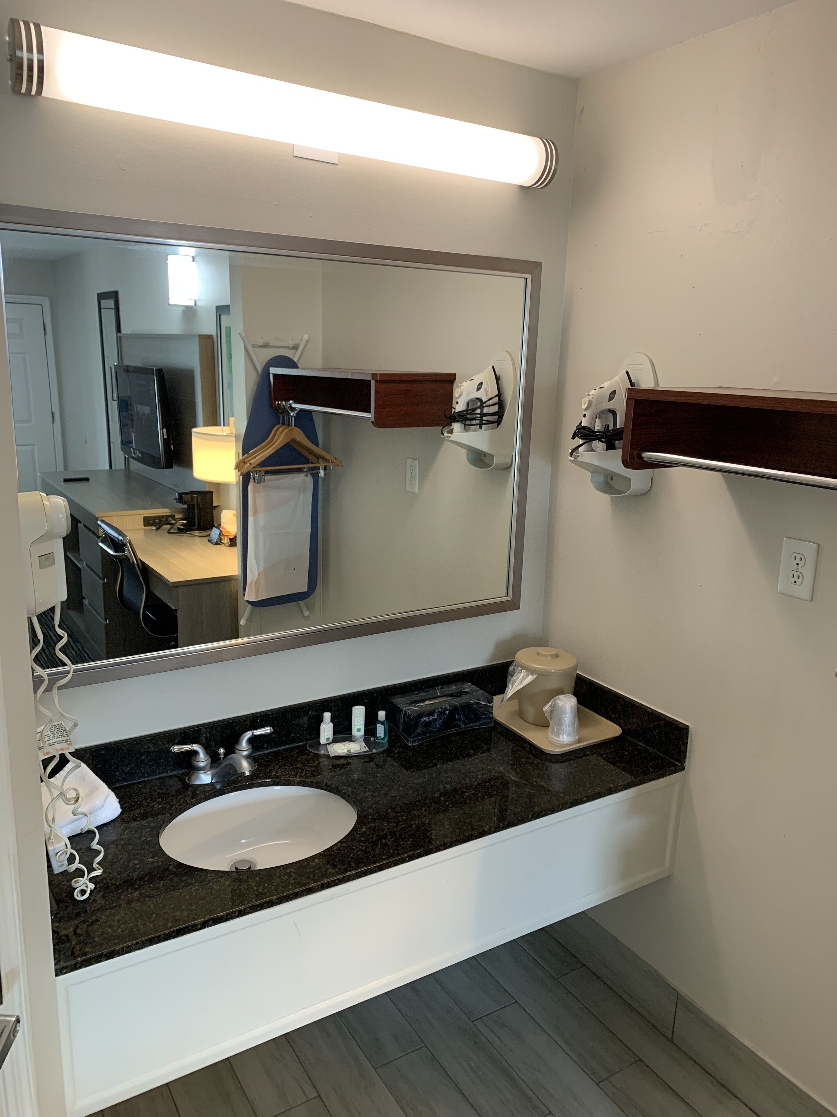 desk, laptop workspace, blackout curtains, iron/ironing board