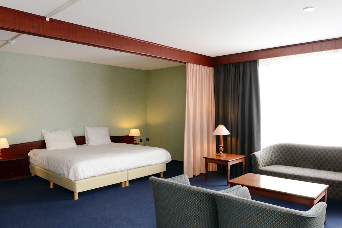 Suite Junior | 1 chambre, literie hypoallergénique, coffre-fort, bureau