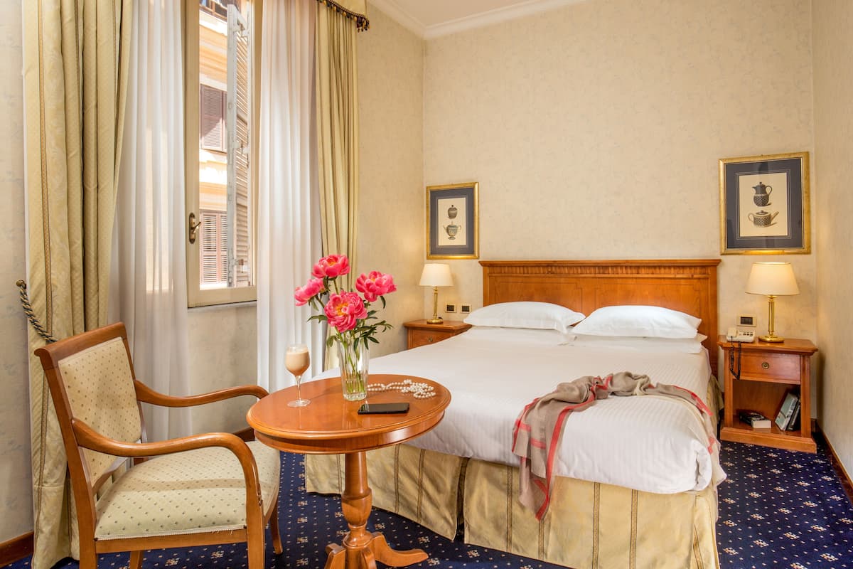 Ropa de cama de alta calidad y minibar