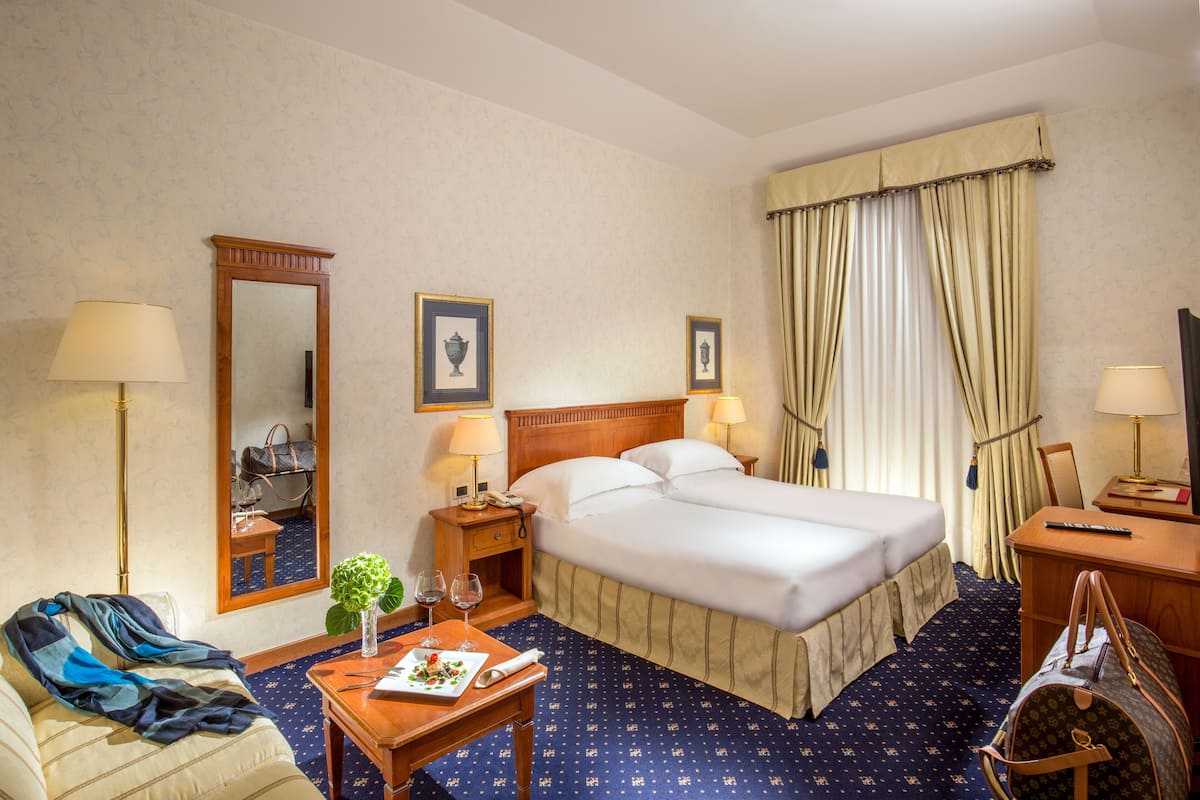 Ropa de cama de alta calidad y minibar