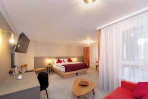 Suite júnior | Roba de llit d'alta qualitat, cobrellits i caixa forta a l'habitació 