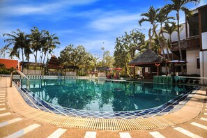 Outdoor pool, pool umbrellas, sun loungers