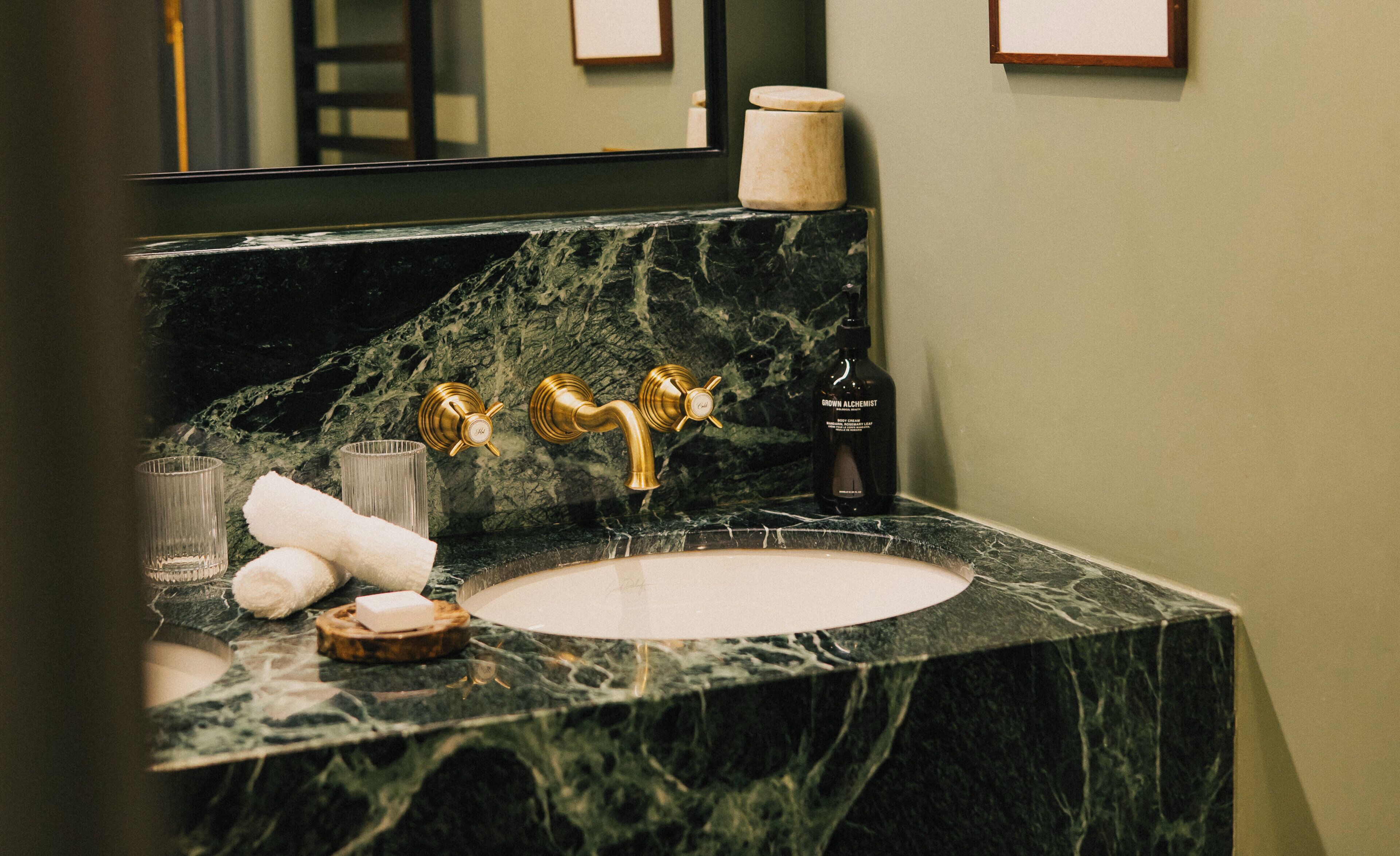 designer toiletries, hair dryer, bathrobes, slippers