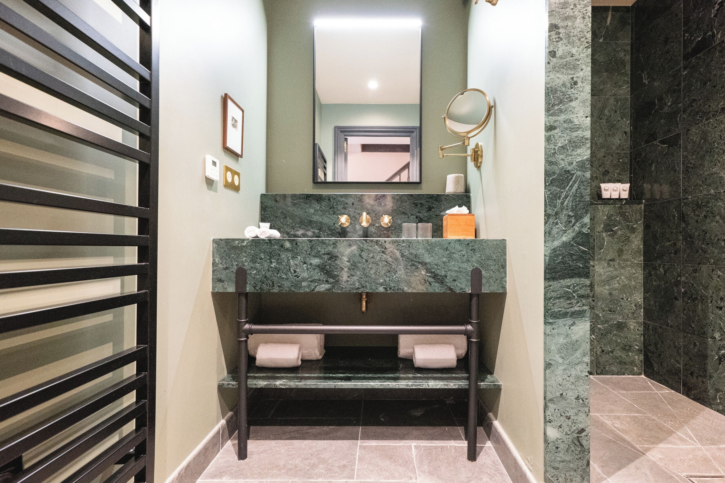 Designer toiletries, hair dryer, bathrobes, slippers