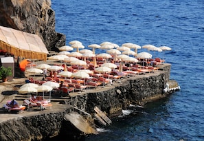 Private beach, sun loungers, beach umbrellas, beach towels