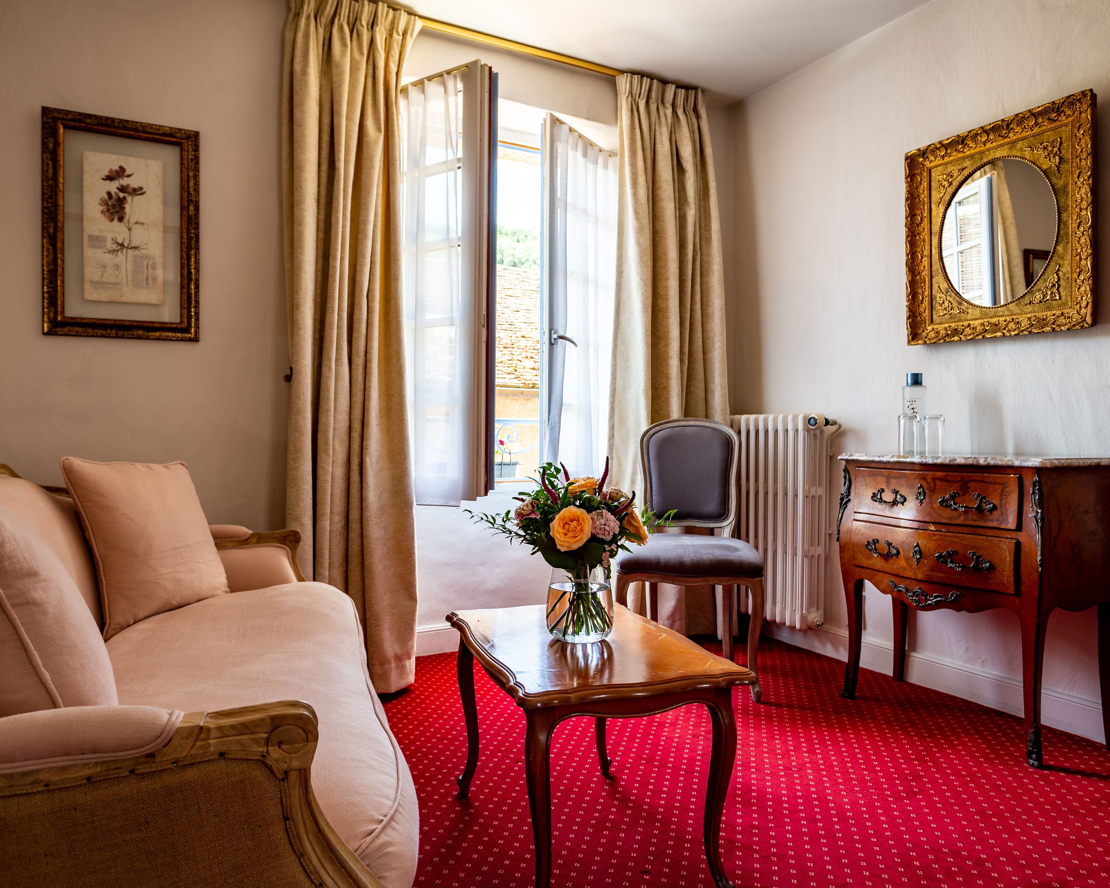 deluxe room, balcony, pool view | living area | 80-inch tv with cable channels