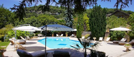 Outdoor pool, open 8:00 AM to 10:00 PM, sun loungers