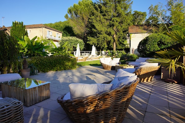 Outdoor pool, open 8:00 AM to 10:00 PM, pool loungers