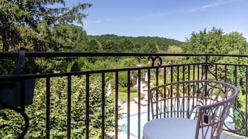 Deluxe Room, Balcony, Pool View | Terrace/patio