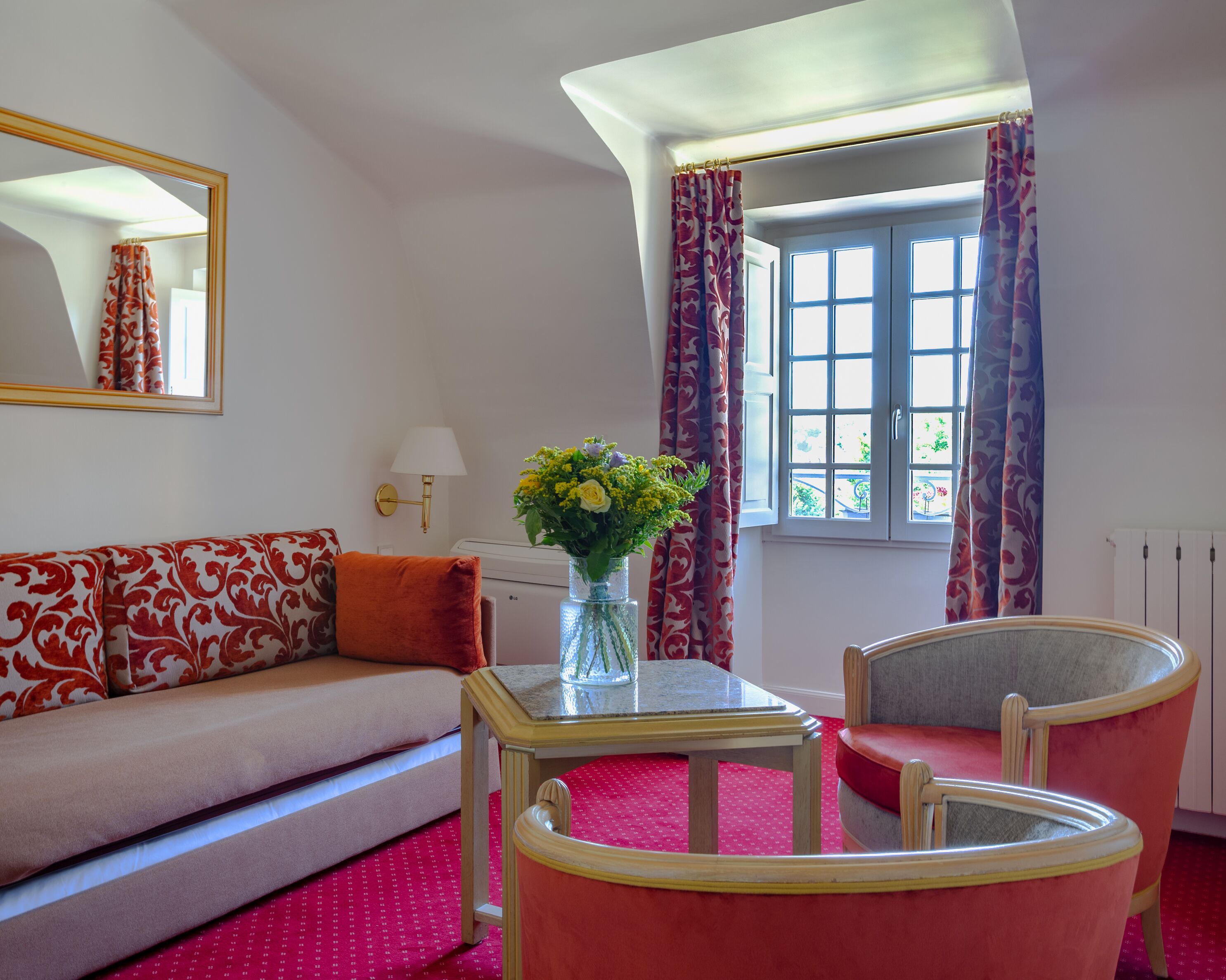 classic suite | living area | 80-inch tv with cable channels