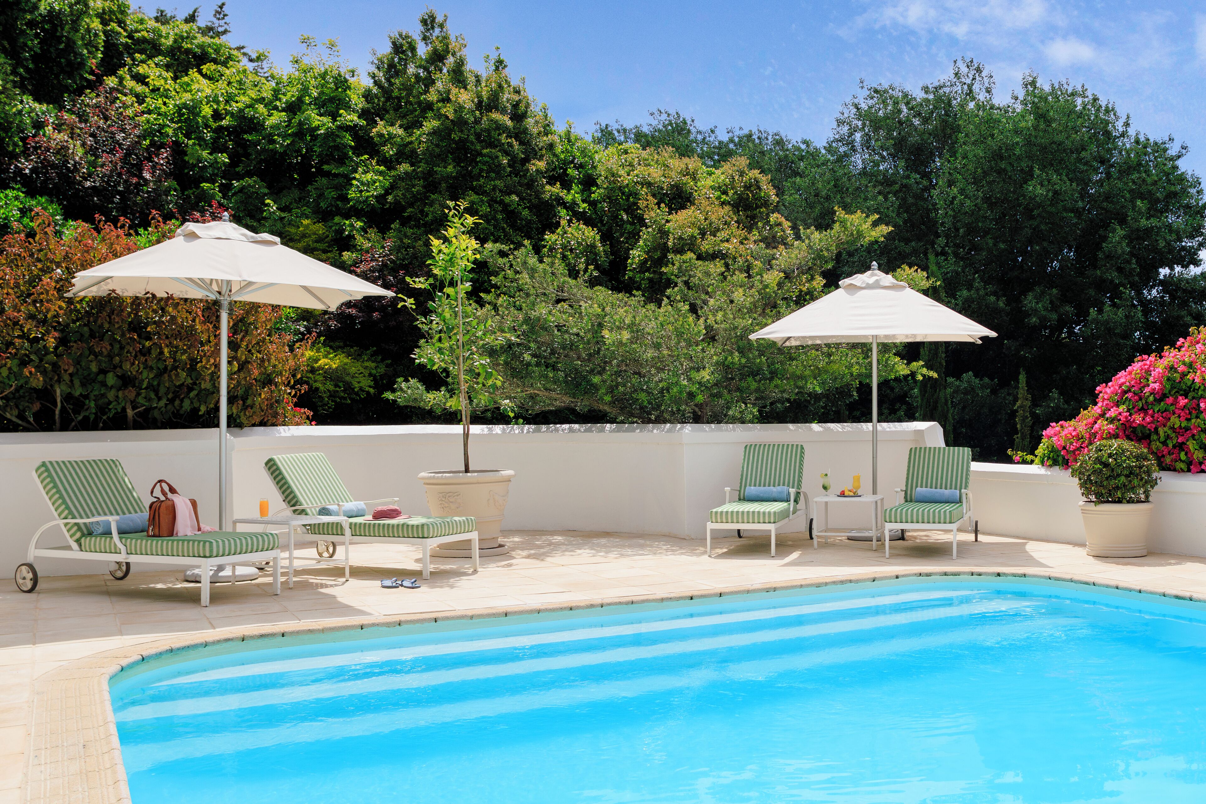 2 outdoor pools, pool umbrellas, pool loungers