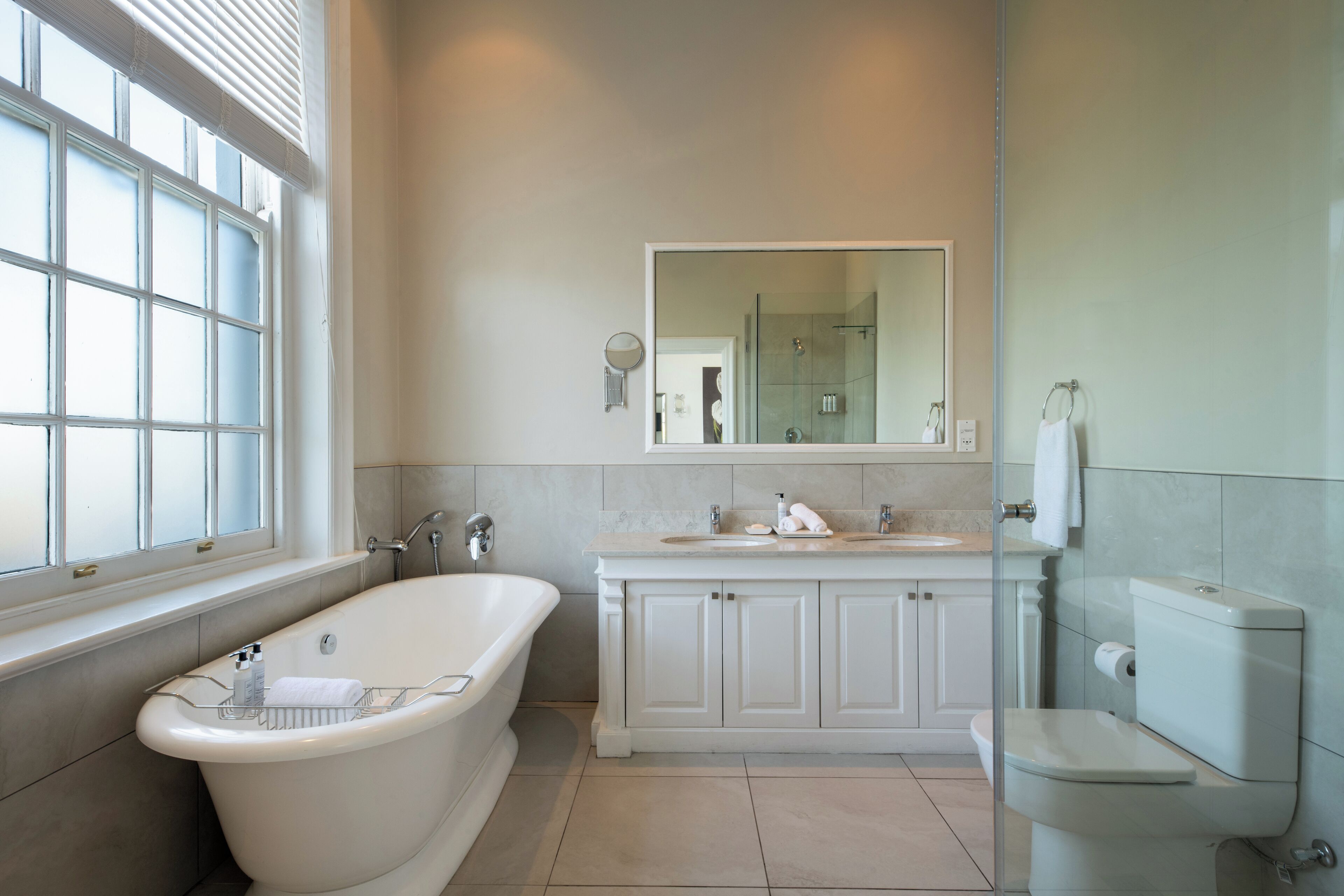 luxury room | bathroom | shower, hair dryer, bathrobes, slippers