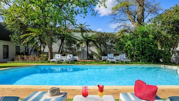 2 outdoor pools, pool umbrellas, pool loungers