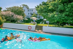 2 outdoor pools, pool umbrellas, pool loungers