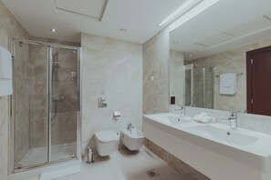 Bathtub, hair dryer, towels
