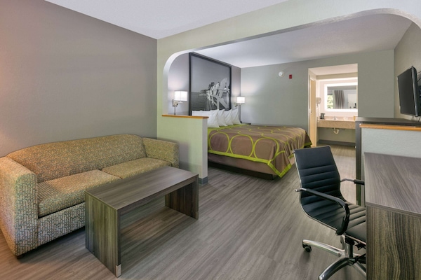 Suite, 1 King Bed, Smoking | Iron/ironing board, cribs (free), rollaway beds (surcharge), WiFi (free)