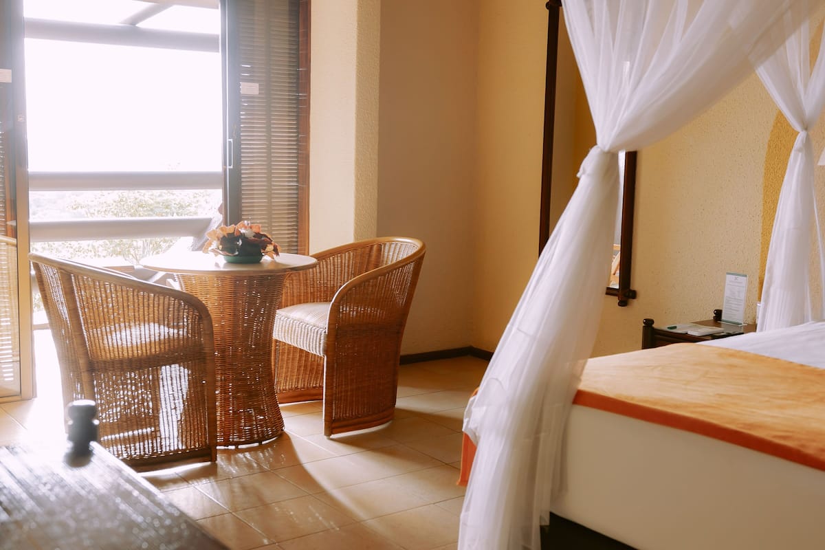 standard double room, golf view | 1 bedroom, minibar, in-room safe, individually decorated