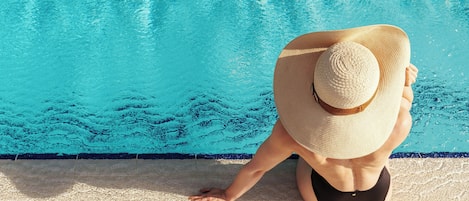 Outdoor pool, open 6:00 AM to 10:00 PM, sun loungers