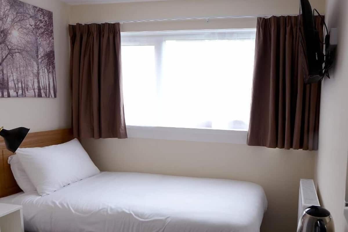 Habitación individual estándar | 1 habitación, ropa de cama de alta calidad, wifi gratis y ropa de cama