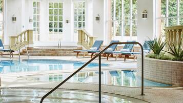 Indoor pool, open 7:00 AM to 9:00 PM, pool loungers