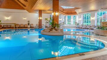 Indoor pool, open 7:00 AM to 9:00 PM, pool loungers