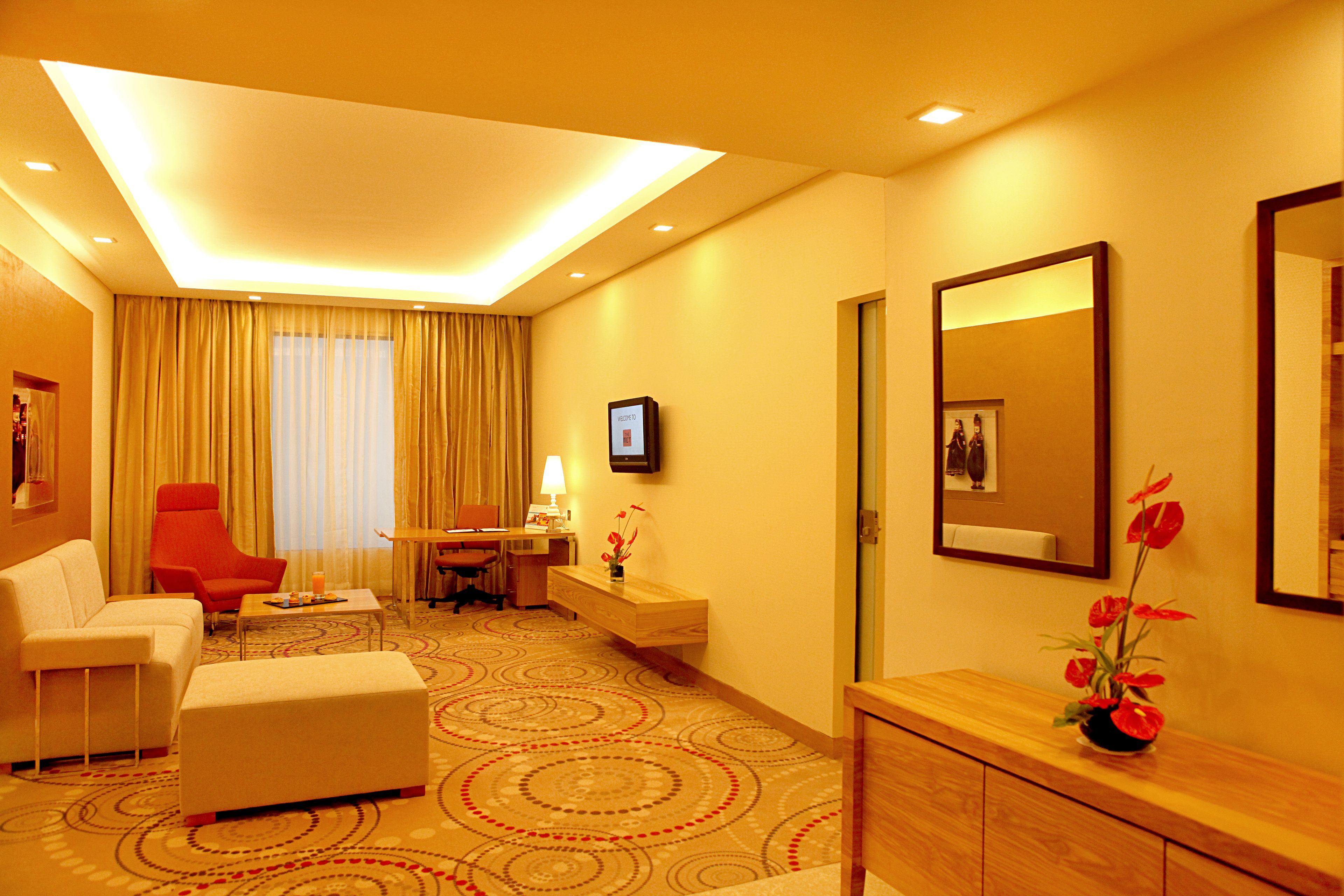 suite, 1 king bed | living area | 32-inch led tv with cable channels, tv