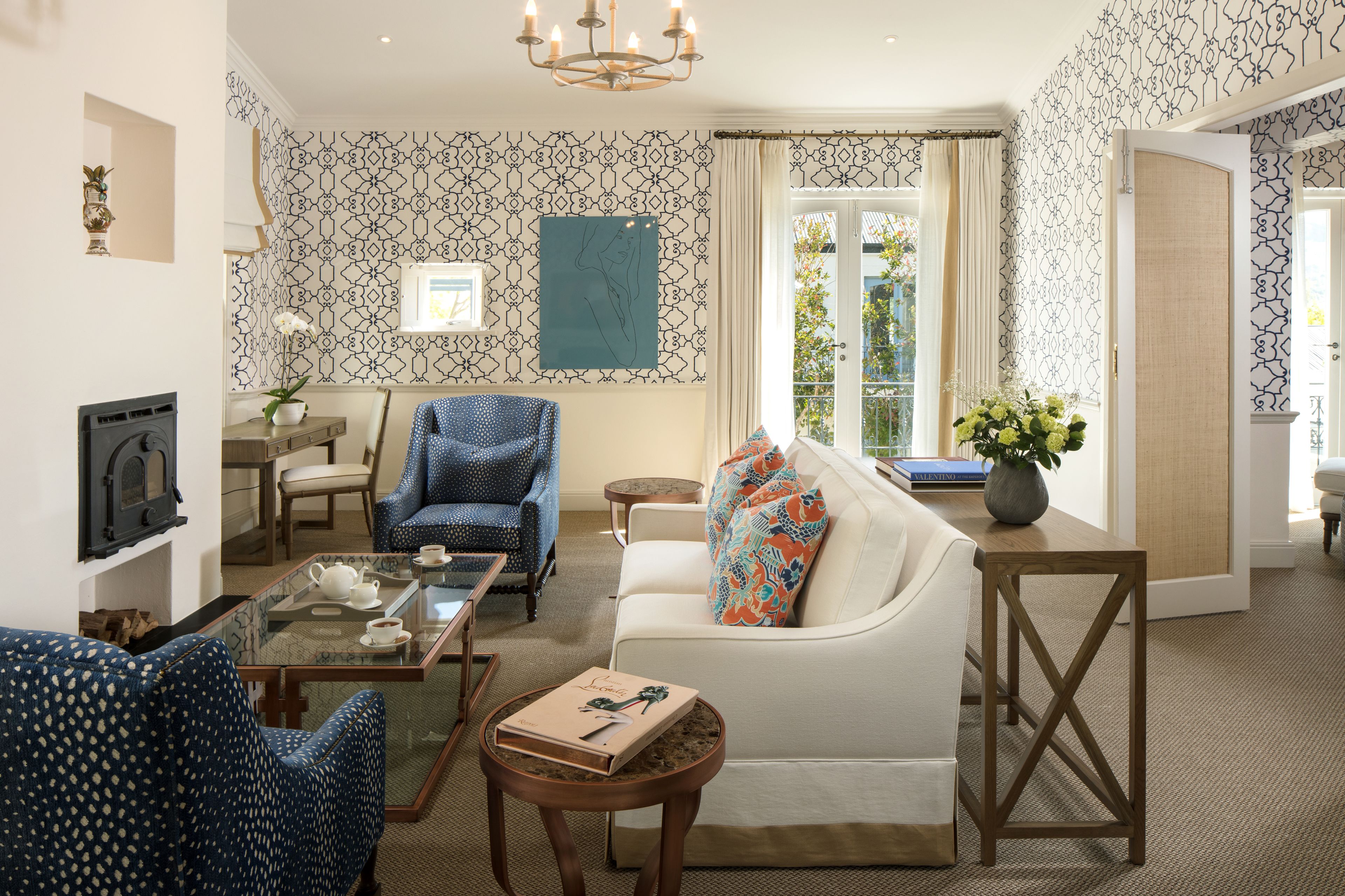 superior suite (four quarters) | living area | 40-inch flat-screen tv with digital channels, tv, fireplace