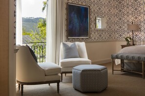 Suite supérieure (Four Quarters) | Literie de qualité, minibar contenant certains articles gratuits