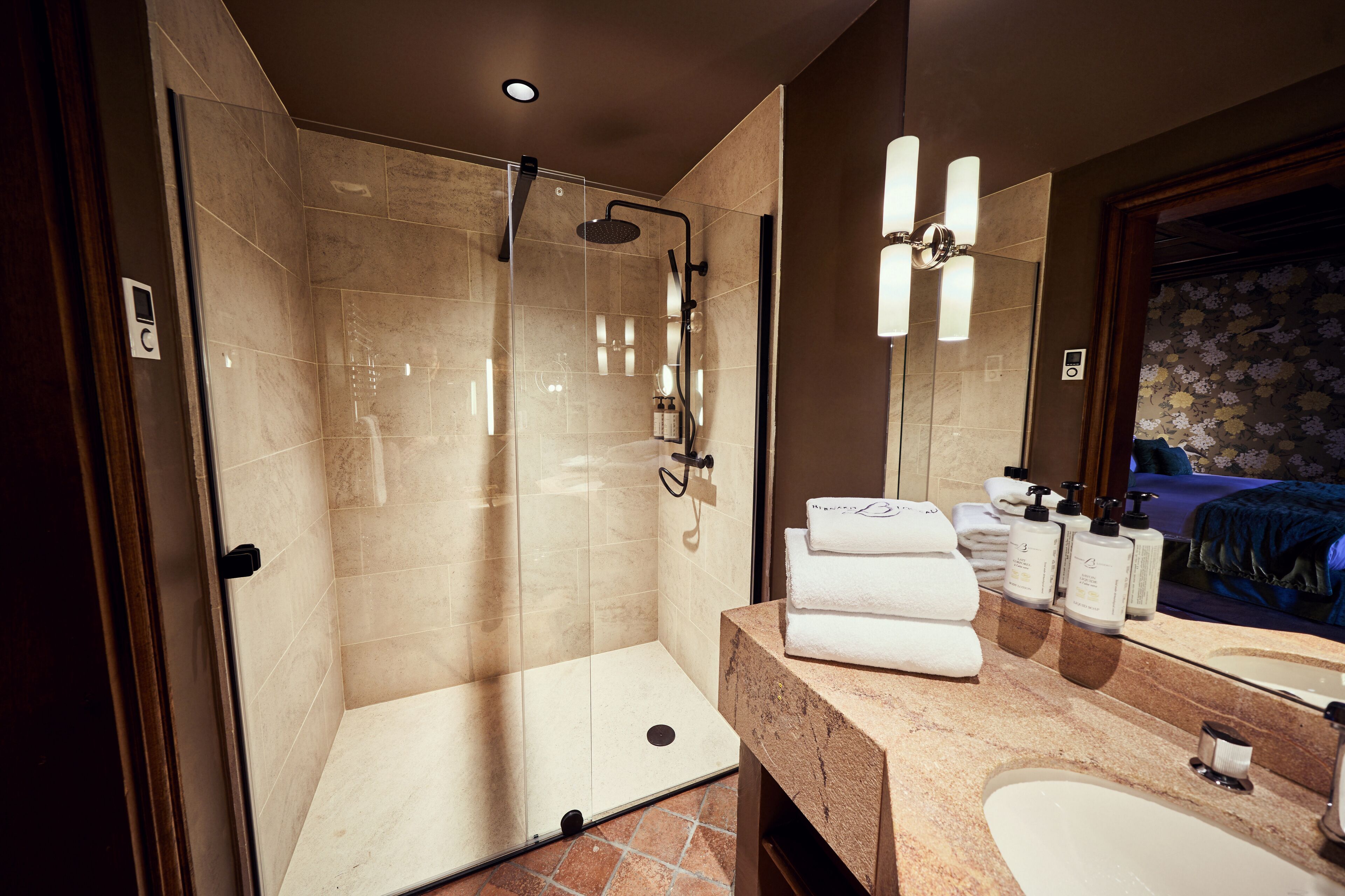 superior room | bathroom | shower, designer toiletries, hair dryer, bathrobes