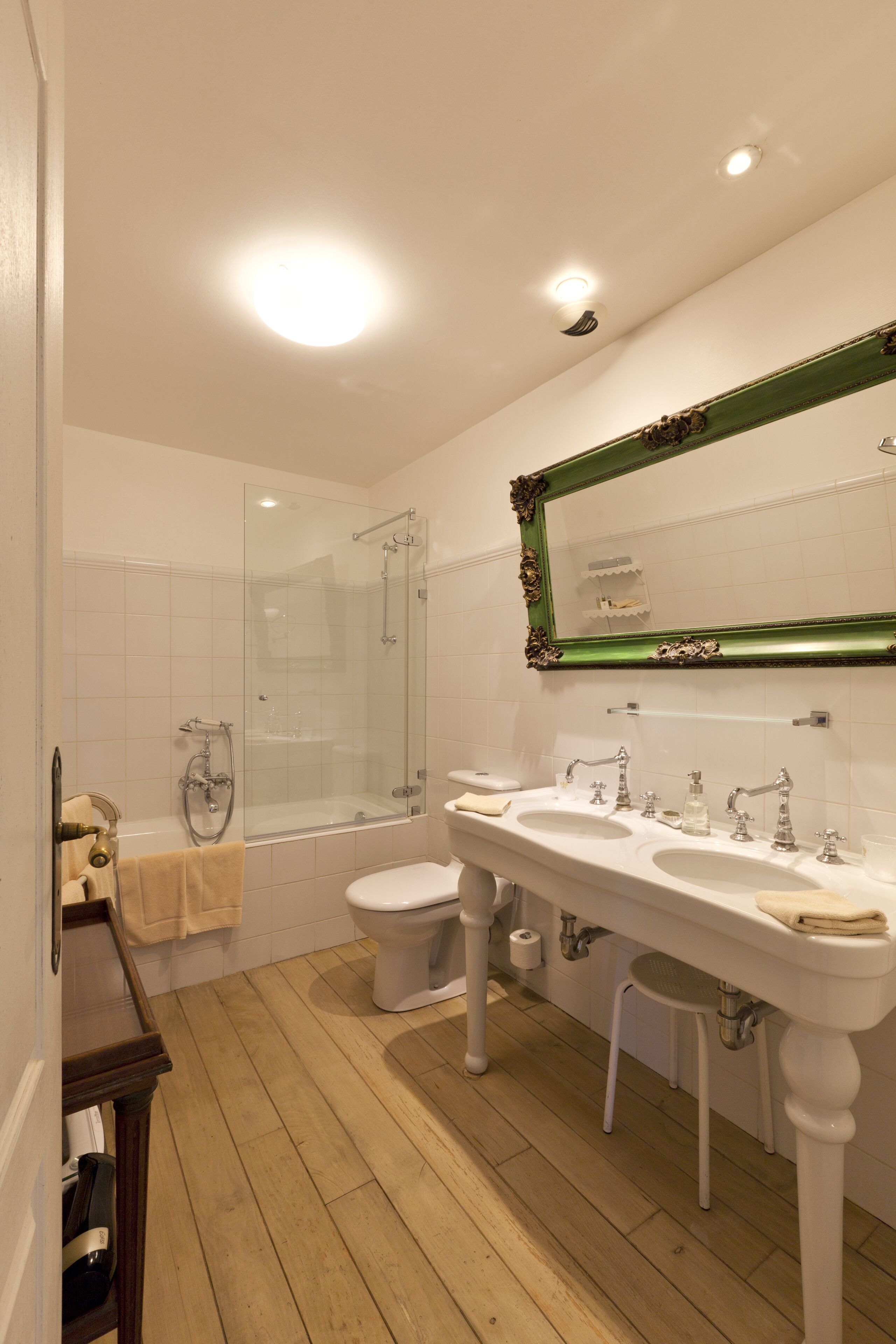 luxury suite | bathroom | bathtub, designer toiletries, hair dryer, bathrobes