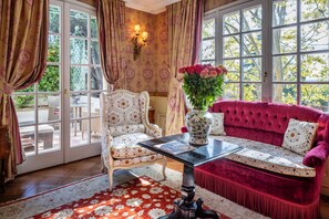 Suite with Terrace with Free Spa Access | Living area | Flat-screen TV, pay films