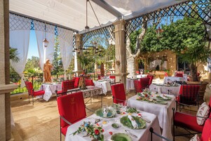 2 restaurants, breakfast, lunch, dinner served; local cuisine