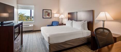 Materassi a doppio strato, una scrivania, postazione laptop