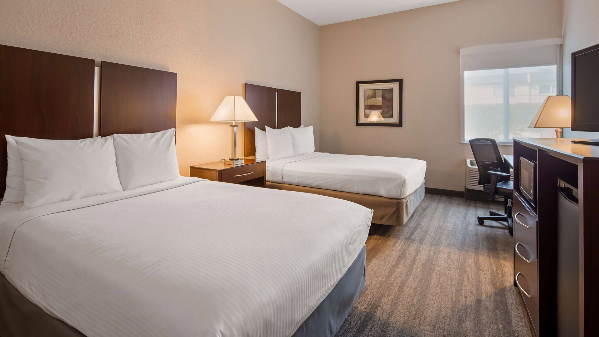 Pillowtop beds, desk, laptop workspace, blackout drapes