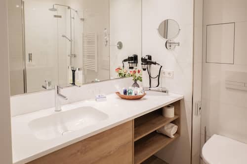 Hair dryer, slippers, towels, soap