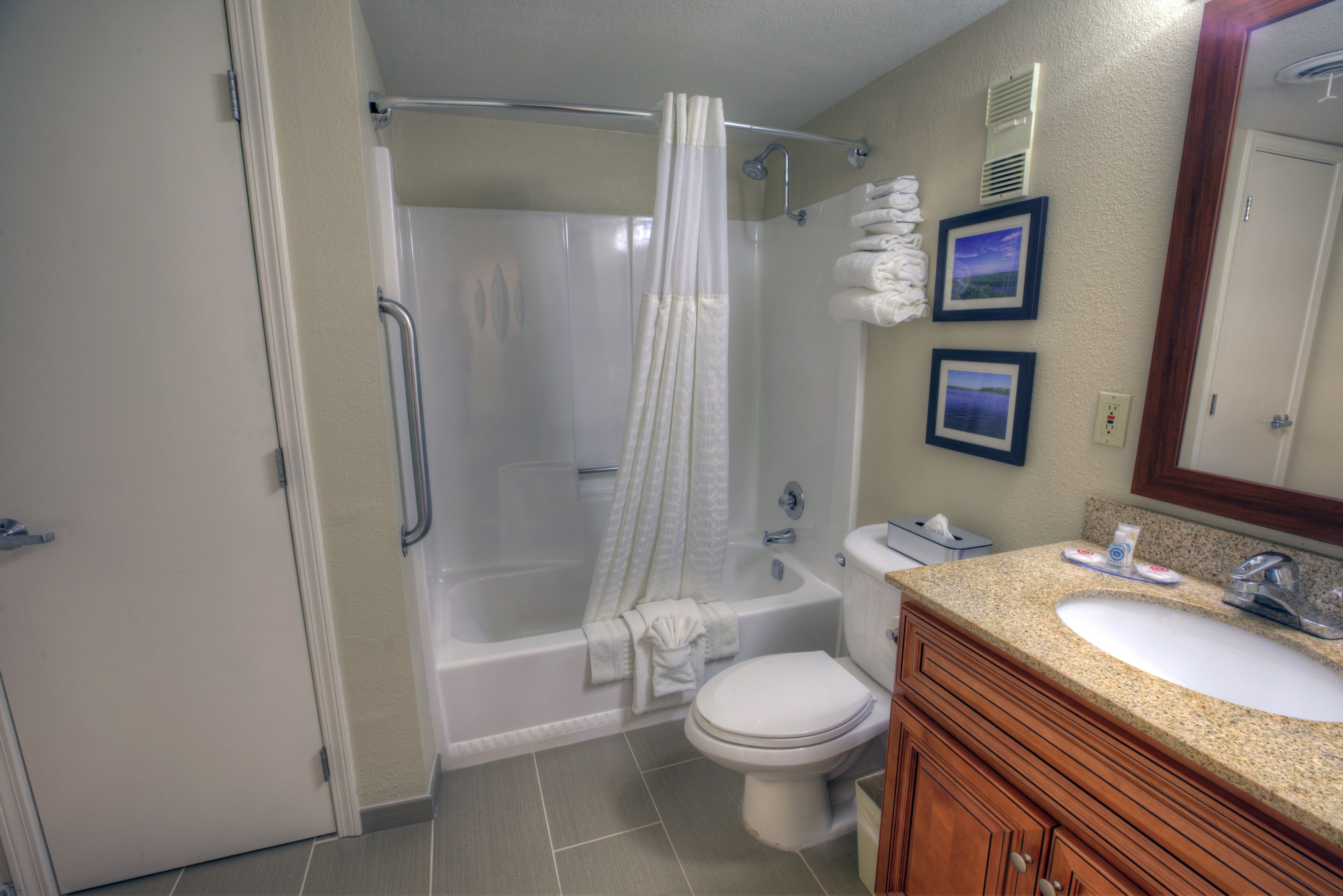 Combined shower/tub, hair dryer, towels, soap