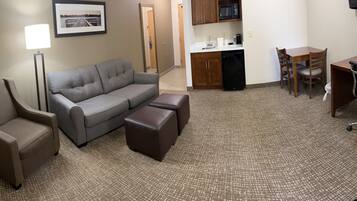 1 King Bed, 2 Bunkbeds | Living area | 32-inch flat-screen TV with cable channels, TV